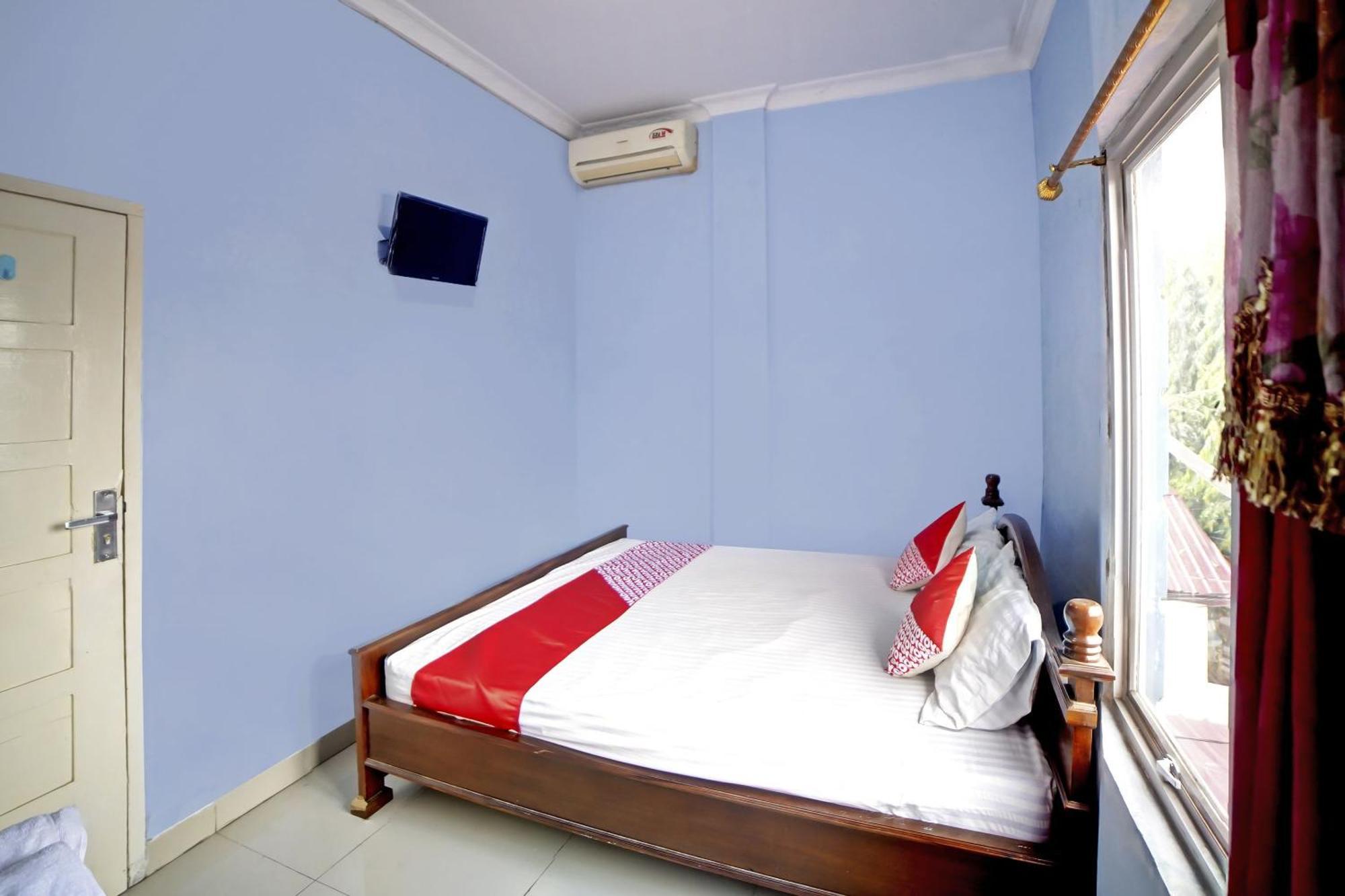 Oyo 90922 Gurusinga Guesthouse Medan Esterno foto